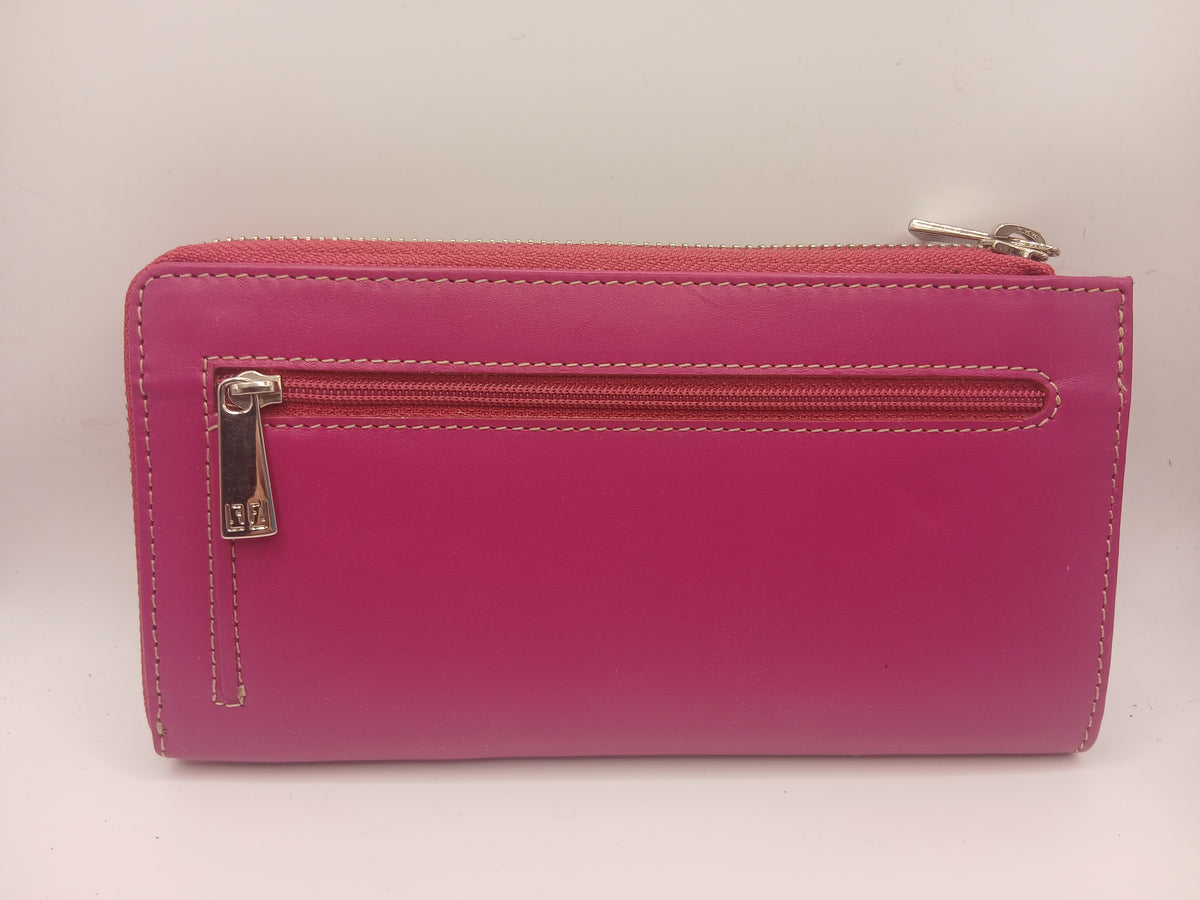 Billeteras de piel color fucsia marca Fasino