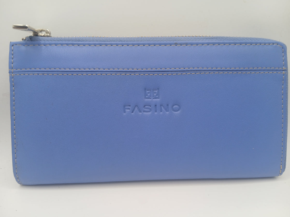 Billeteras de piel color Celeste marca Fasino